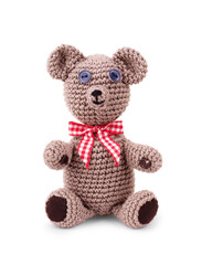 Funny handmade knitted toy bear on white background. Amigurumi toy. Crochet stuffed animals.