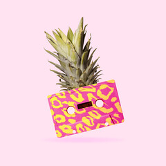 Contemporary art collage, modern design. Party mood. Composition with retro cassette with bright pattern and pineapple.