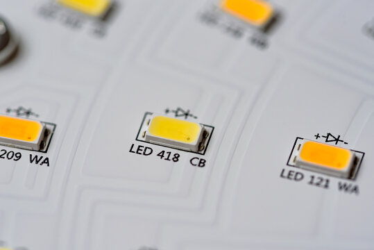 Printed circuit boards for lighting fixtures, surface-mount LEDs