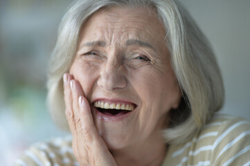 beautiful senior woman posing at home