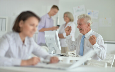 Fototapeta premium group of people working in office