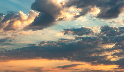 Naklejka na ściany i meble Colorful cloudy sky at sunset. Abstract nature background.