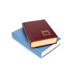 Stack of books in colour covers with white sheets isolated on a white background