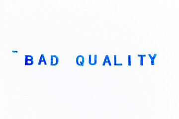 Blue color ink of rubber stamp in word bad quality on white paper background