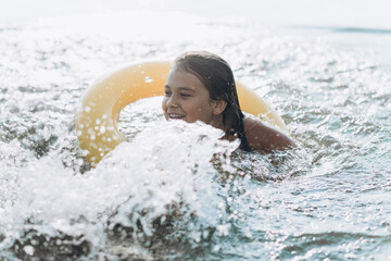 Happy teen girl swim in water, have fun. Children fun games, activity, vacation concept