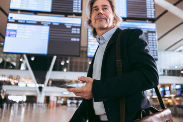 Businessman on transit at airport during international journey