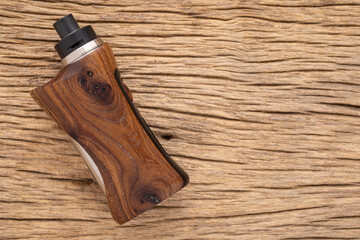 high end rebuildable dripping atomizer with natural stabilized walnut wood regulated box mods on...