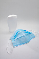 Face mask and plastic hand sanitizer