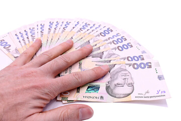 Banknotes of Ukraine in denominations of five hundred hryvnia in hand