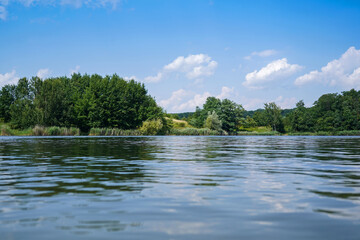 calm waters of lake Podkowa near Pinczow, Ponidzie, Poland