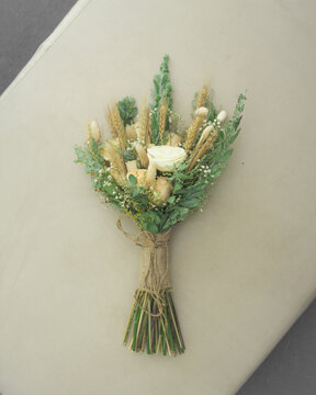 Bouquet of yellow rice isolated with flower and leaf.