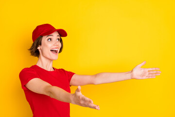 Profile photo of nice impressed brown hair lady look empty space wear t-shirt isolated on yellow color background