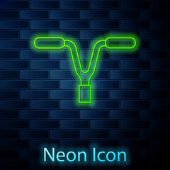 Glowing neon line Bicycle handlebar icon isolated on brick wall background. Vector