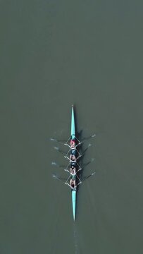 Quadri scull or Four scull with four rowers in a classic rowing motion.