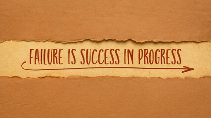 Failure is success in progress - inspirational handwriting on a handmade paper, business, education and personal development concept