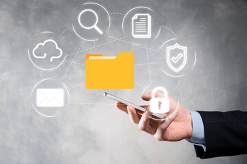 Document Management System DMS .Businessman hold folder and document icon.Software for archiving, searching and managing corporate files and information.Internet Technology Concept.Digital security