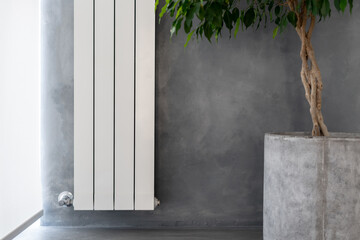 White and new heating radiator on wall - obrazy, fototapety, plakaty