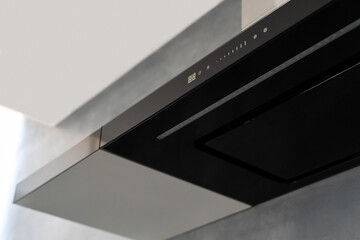 Black kitchen exhaust hood with touch controls