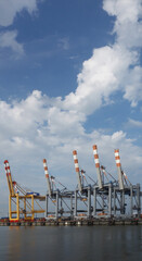 lined cranes in the harbor, view from the sea, Bremerhaven, Germany