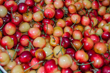 Yellow cherries at a fruit stall in the market