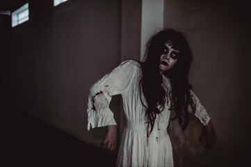 Portrait of asian woman make up ghost,Scary horror scene for background,Halloween festival...