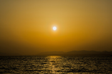 sunset over the lake shinji