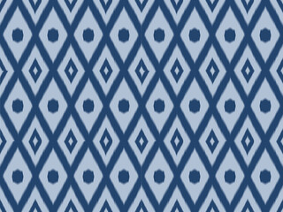 Ikat pattern as ethnic fabric in blue tone with switching circle and diamond design. Wallpaper seamless pattern design in navy blue color. Design for fabric, wallpaper, background in pastel tone. 