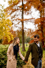 Young couple in the autumn park