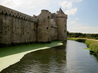 Fototapeta na wymiar Exterior views of the castle of Suscinio: towers and moat, in Sarzeau in Morbihan, next to the Atlantic Ocean, in Brittany, France