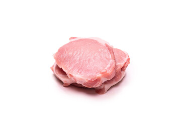 Raw pork pieces isolated on a white background.