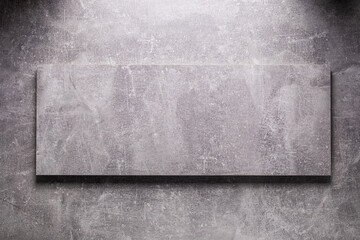 Abstract grey background texture at table or wall surface. Gray piece of chipboard