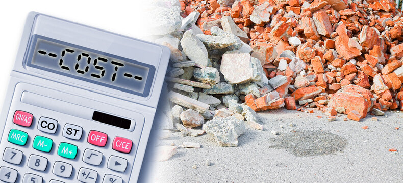 Demolition costs and costs about waste management - concept with concrete and brick rubble debris on construction site after a demolition of a building and calculator - Powered by Adobe
