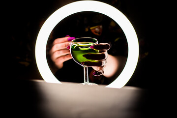 glass of wine in hand