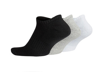 Set of short socks white, grey, black isolated on white background. Three pair of socks in different colors. Sock for sports on invisible foot as mock up for advertising, branding, design.