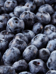 Blueberry fruit top view isolated on a white background, flat lay overhead layout with mint leaf, healthy design concept.