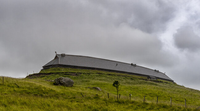view of the Lofoten Viking Musuem near Flakstad on an overcast and rainy summer day
