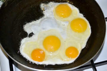 Frying fried eggs in a frying pan