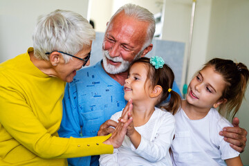 Family visiting mature male patient in hospital. Healthcare, pensioner, family support concept