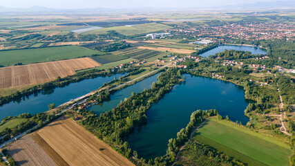 aerial view over the many small lakes. Aerial urban green park in suburban area.
