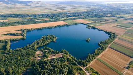 Aerial view of lake. Shooting from the air. Environmental, healthy lifestyle concept. Aerial view of Europe landscape.