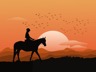 Silhouette of a woman riding a horse on top of a mountain with sunset in the background.