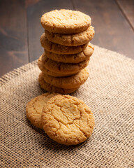 Pile of Homemade crunchy cookies on wooden rustic table