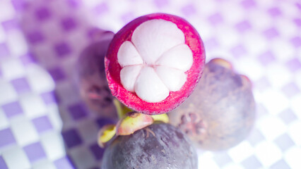 Fresh ripe mangosteen fruit from the garden with natural background Thailand