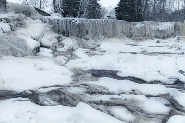 Fototapeta premium Frozen Keila-Joa waterfall by winter. Harjumaa, Estonia