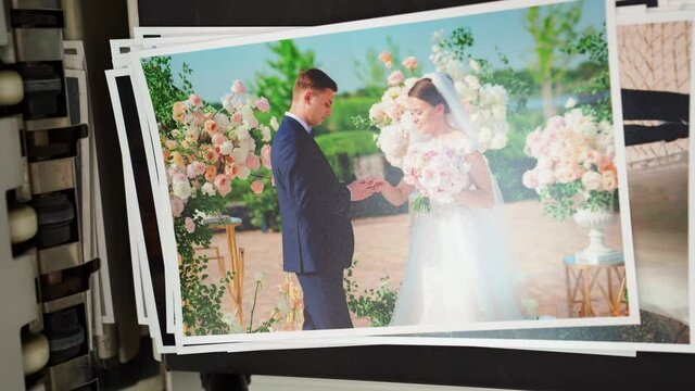 top view. chemical printing of photos from the wedding in the photo laboratory. 