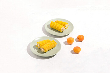 Boiled corn on the cob vegan vegetarian dish