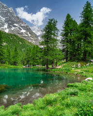 Fototapeta na wymiar The scenic Blue Lake (Lago Blu) surrounded by a beautiful alpine landscape near Cervinia, Aosta Valley, Italy