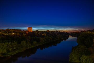 Noctilucent clouds lighting up the night sky