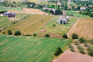 Aerial view of agricultural crops of wheat, olives and orange, on the outskirts of Thessalonica, it is the capital of the Macedonia, located on the Thermaic Gulf, Greece, June 2014