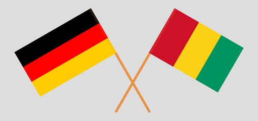 Crossed flags of Germany and Guinea. Official colors. Correct proportion